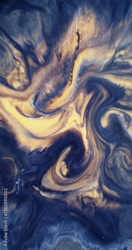 Acrylic pigment. Ripple ink. Defocused yellow golden blue color marble texture particles water floating on abstract art background. Acrylic pigment. Ripple ink. Defocused yellow golden blue color marble texture particles water floating on abstract art background.