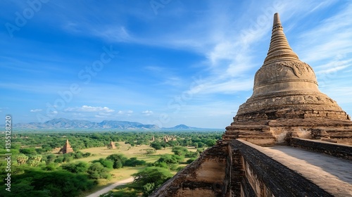 Stunning panoramic view of ancient Bagan temple surrounded by lush green landscape and vibrant blue sky : Generative AI