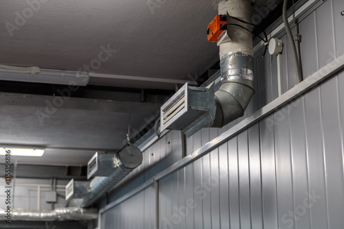 Obraz na płótnie Air heating system for industrial premises, new technologies. ventilation holes in pipes w salonie
