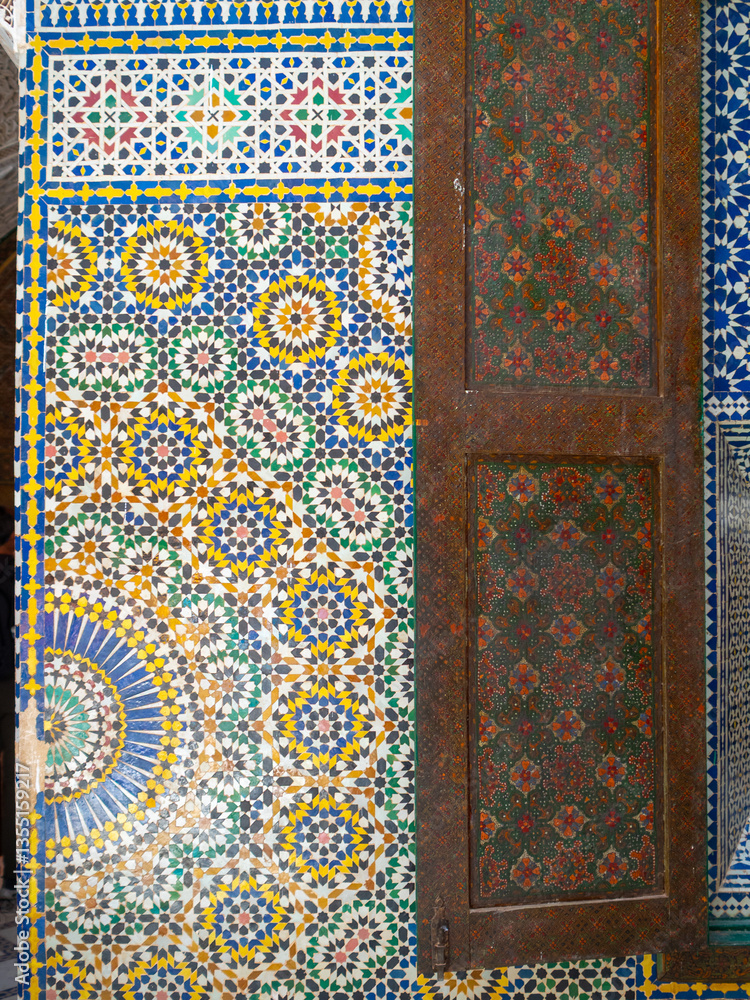 Zellij mosaic geometric pattern and wooden window shutter, Telouet Kasbah, Morcocco