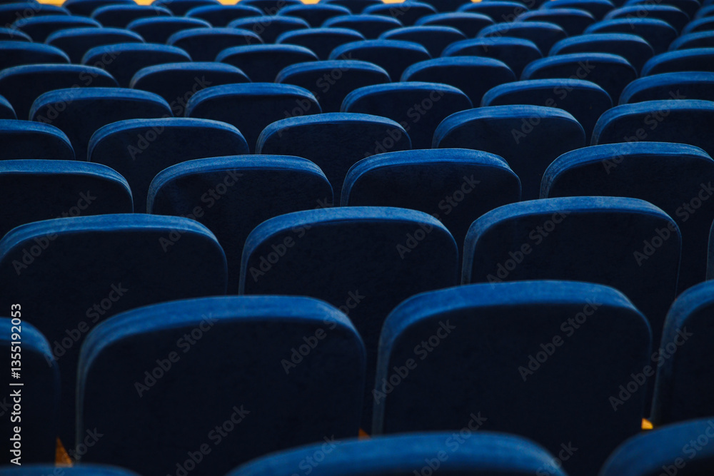 Fototapeta premium Blue empty seats in the audience prepared for the participants of the conference or presentation