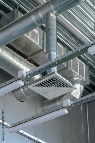 Heating pipe system in the warehouse of the enterprise. ceiling ventilation system