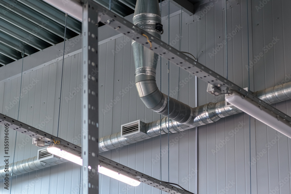 Heating pipe system in the warehouse of the enterprise.Technological pipes with holes