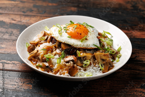 Hawaiian Loco Moco with hamburger, fried egg and brown mushroom gravy