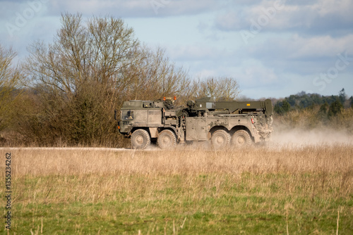 Obraz na płótnie a British army MAN SVR (Support Vehicle Recovery) 8x8 Truck in action on a military exercise w salonie
