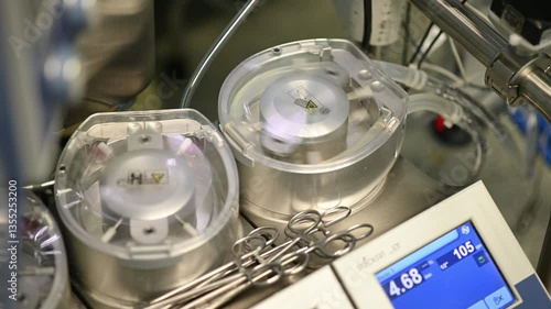 Discover Advanced Laboratory Equipment in Action, Delivering Precise Measurements for Research. A blood circulation machine in an operating room used during heart surgery.