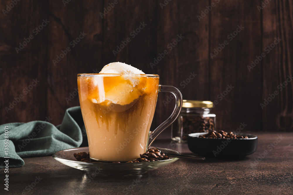 Delicious sweet affogato coffee with creamy ice cream in a cup on the table