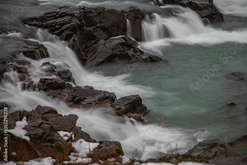 Urridafoss waterfall in Iceland on a foggy winter day