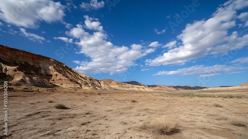 Breathtaking arid landscape with dramatic cliffs and scattered clouds in the sky : Generative AI
