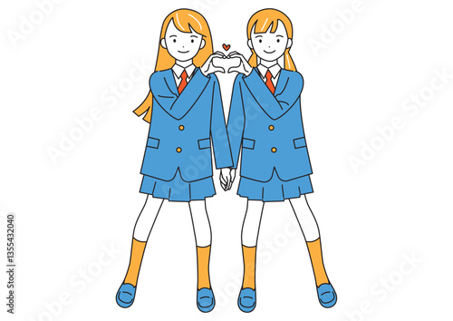 指でハートマークを作るポーズの女子学生