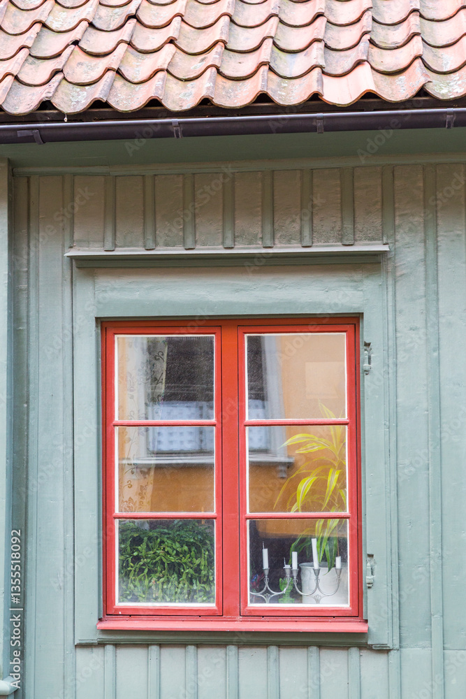 Europe, Sweden, Stockholm. Reflection in window.