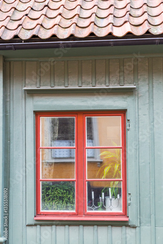Obraz na płótnie Europe, Sweden, Stockholm. Reflection in window. w salonie