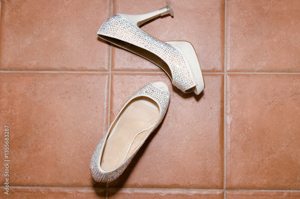 Bride white pair of wedding shoes
