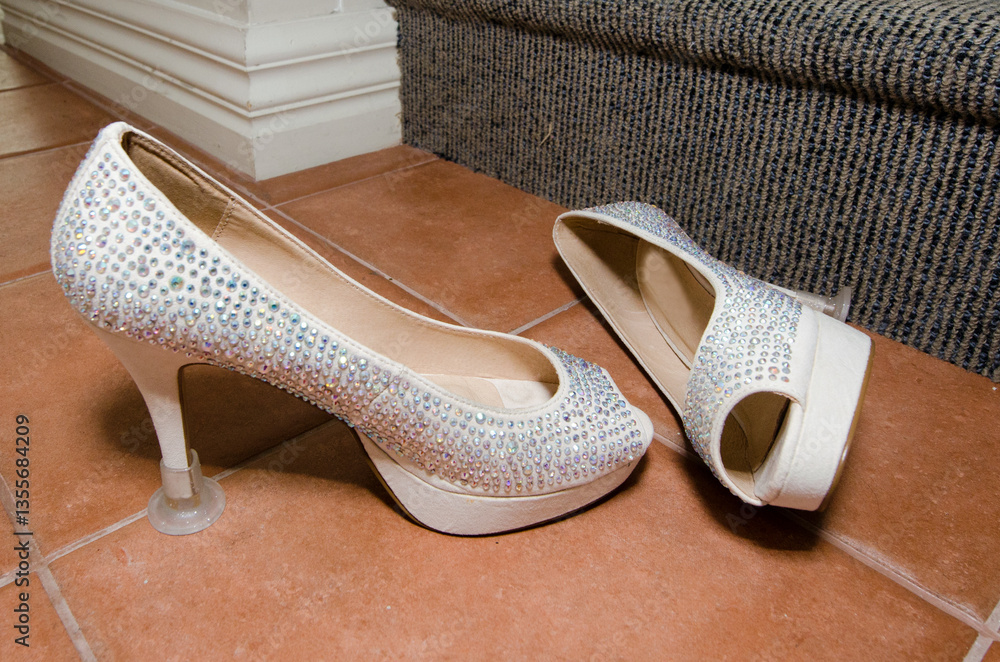 Bride white pair of wedding shoes