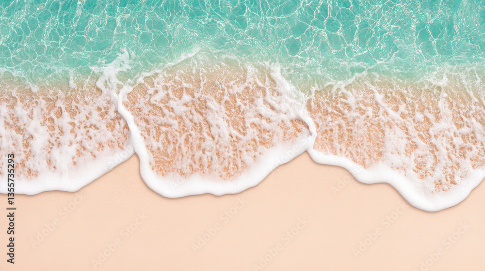 Fototapeta premium Waves gently wash over sandy beach
