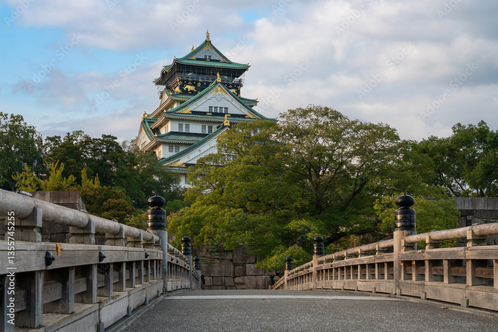 Osaka Castle from the side of the Gokuraku-bashi Bridge over the Inner Moat on a sunny autumn morning, Osaka, Japan