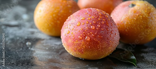 Ripe Mangoes with Water Droplets on a Dark Background, Refreshing Summer Fruit, Close-up