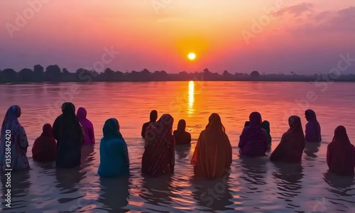 Chhath Puja in Bihar, with women standing waist-deep in the river, offering prayers to the setting and rising sun
