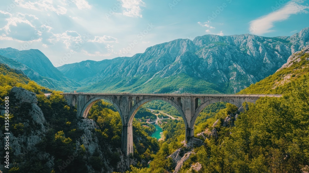 Fototapeta premium Tara Bridge Montenegro's Architectural Marvel Amidst Stunning Mountain Views