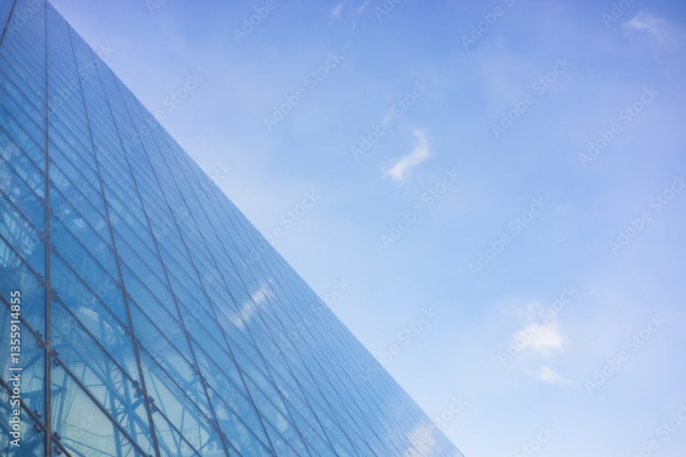 Moerenuma Park's Glass Pyramid Reflecting a Bright Sky with Subtle Clouds in a Minimalist Composition. Moerenuma Park's Glass Pyramid Reflecting a Bright Sky with Subtle Clouds in a Minimalist Composition.