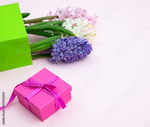 Wallpaper Mural Mothers day. Fresh Hyacinths, Spring  flowers and a gift box on pink background Torontodigital.ca