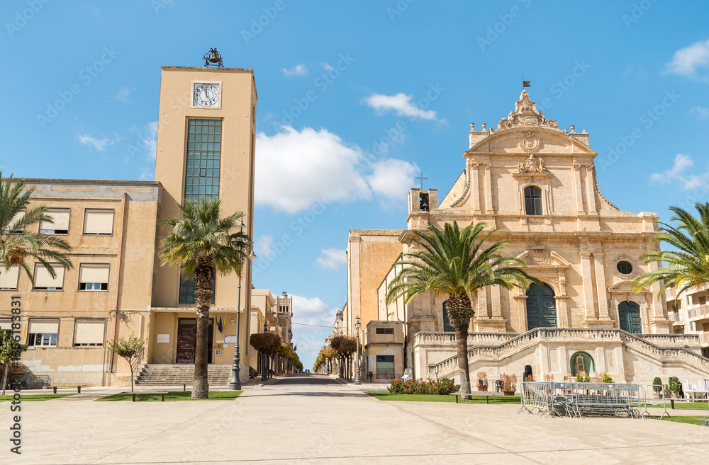 Fototapeta premium Central square featuring the Parish of San Bartolomeo Apostolo, the Mother Church of Ispica, Ragusa Province, in eastern Sicily, Italy