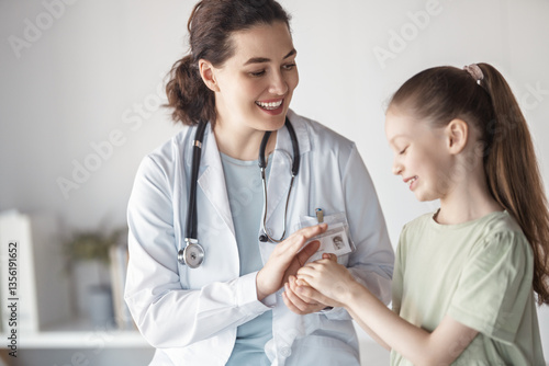 patient with a doctor in medical office