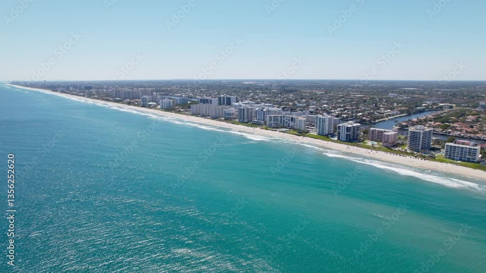 Aerial: Atlantic Ocean with hotels, homes and beaches during the day in Highland Beach, Florida, USA, push in drone shot Aerial: Atlantic Ocean with hotels, homes and beaches during the day in Highland Beach, Florida, USA, push in drone shot