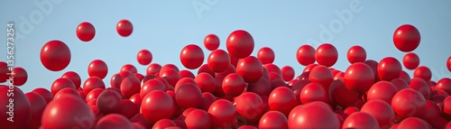 Red spheres falling onto pile, blue sky background, abstract concept