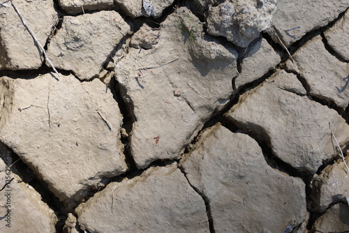 cracked lake bed surface due to aridity