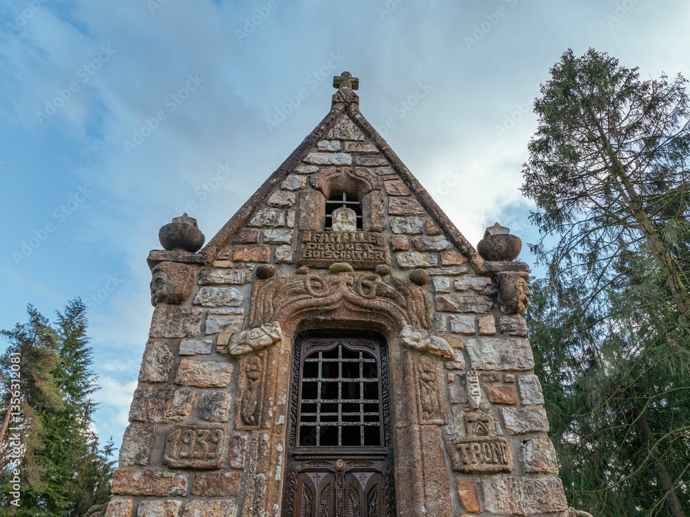 Historic stone chapel facade with intricate carvings. Historic stone chapel facade with intricate carvings.