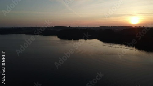 Wallpaper Mural Aerial Drone Shot at Dusk Over Stokkavatn Lake with Silhouetted Landscape Torontodigital.ca