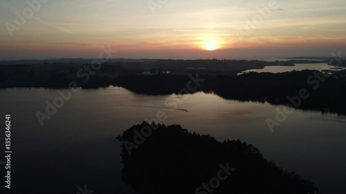 Wallpaper Mural Aerial Drone Shot at Dusk Over Stokkavatn Lake with Silhouetted Landscape Torontodigital.ca