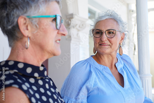 Wallpaper Mural Two mature women enjoying a conversation outdoors during the day Torontodigital.ca