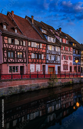 Obraz na płótnie Half timbered houses by canals of Little Venice in Colmar, France at sunset w salonie
