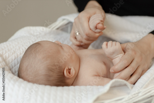 Photos baby reflex check, infant check up on pediatrician's visit card