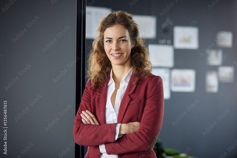 Portait of smiling businesswoman in office Portait of smiling businesswoman in office