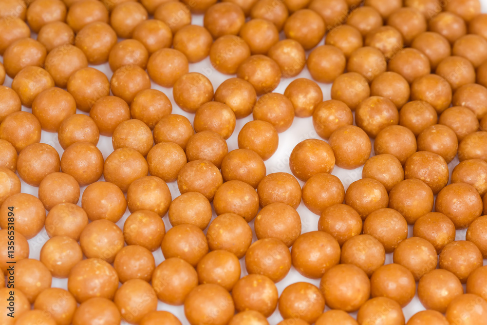 Fototapeta premium Dragee layer with honey and other beekeeping products close-up