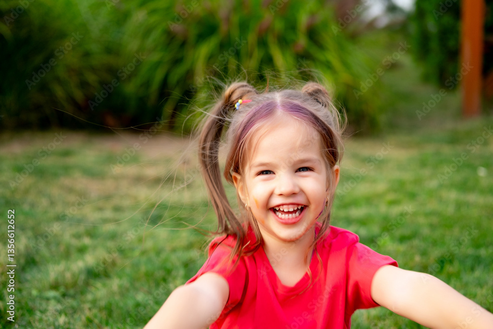 a small child girl with painted fingers in bright colors on her hands in summer on a green lawn, a bright summer photo of a happy child with colorful fingers in colors a small child girl with painted fingers in bright colors on her hands in summer on a green lawn, a bright summer photo of a happy child with colorful fingers in colors