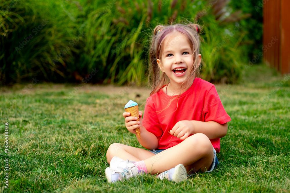 Little baby girl eating ice cream in summer on a green lawn grass, bright summer photo of a happy and laughing child with ice cream Little baby girl eating ice cream in summer on a green lawn grass, bright summer photo of a happy and laughing child with ice cream