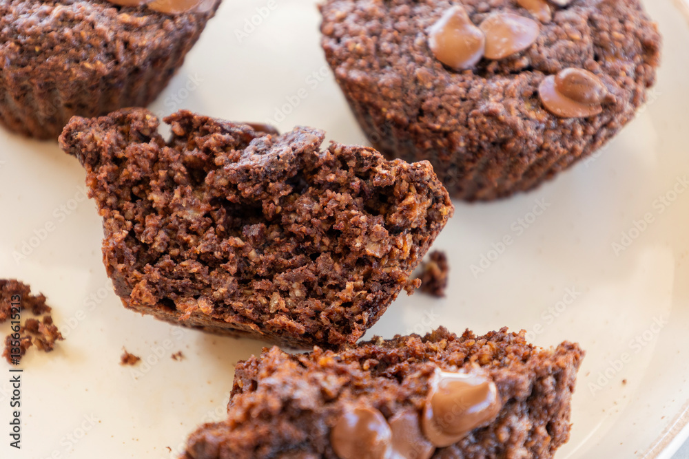 chocolate banana muffins on light background chocolate banana muffins on light background