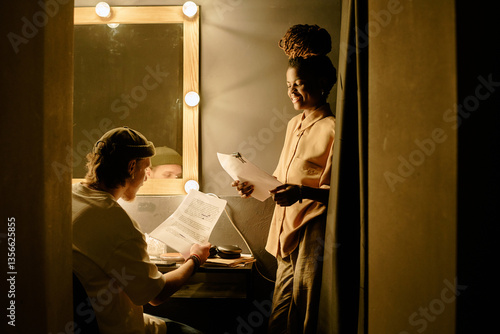Obraz na plátne Two people in dressing room collaborating on theater script