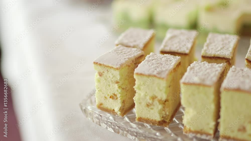 Close Up Of Cheesecake With Sugar Sprinkles On A Tray Close Up Of Cheesecake With Sugar Sprinkles On A Tray