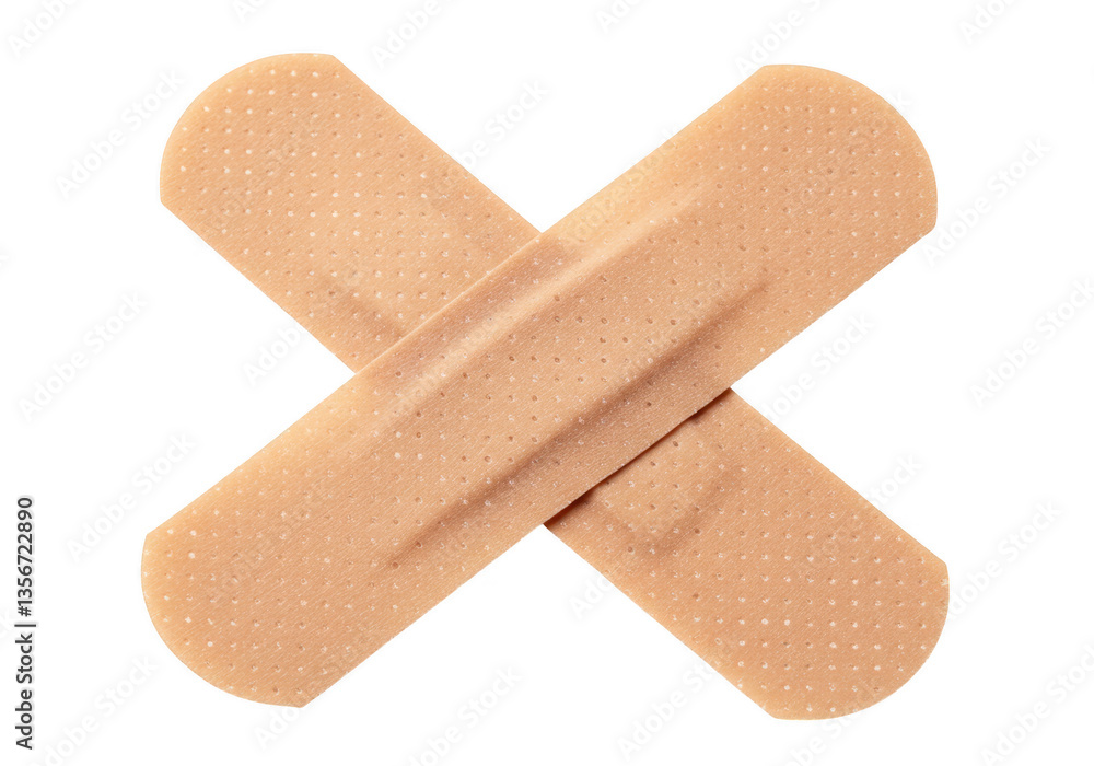 Two beige adhesive bandages arranged in an X shape isolated on transparent background Two beige adhesive bandages arranged in an X shape isolated on transparent background