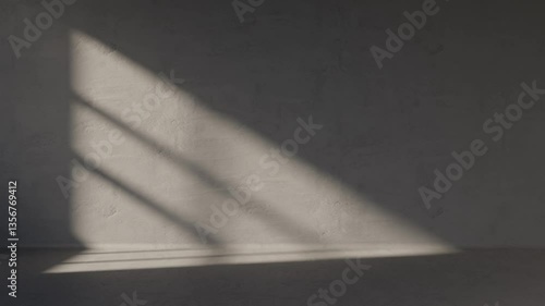 Empty concrete room with window light motion from sunrise. building gray wall in apartment with sunlight shadow. Industrial office space showroom. Abstract architecture background.