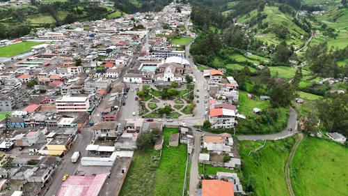aerial video of the town pintag with background of green mountains in ecuador