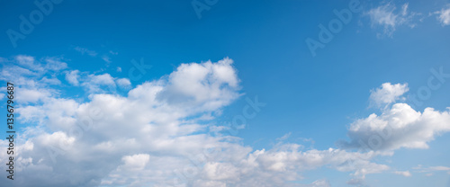 blue sky overcasted with cumulus clouds, blue sky with copy space above