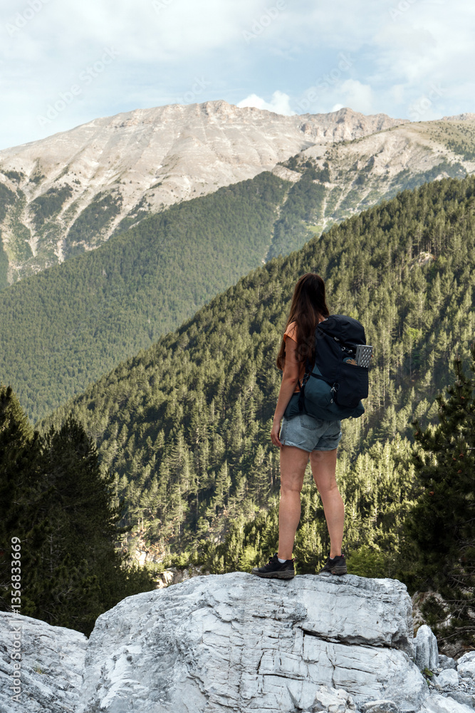 Obraz premium Group of Tourists Hiking to the Summit of Mount Olympus in Greece