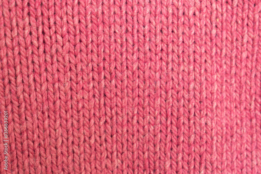 knitted texture, pink fuchsia sweater or carpet, pattern of back loops and front. English elastic band pattern. industrial knitting of clothes made of wool, acrylic or cotton. background, knitting. knitted texture, pink fuchsia sweater or carpet, pattern of back loops and front. English elastic band pattern. industrial knitting of clothes made of wool, acrylic or cotton. background, knitting.