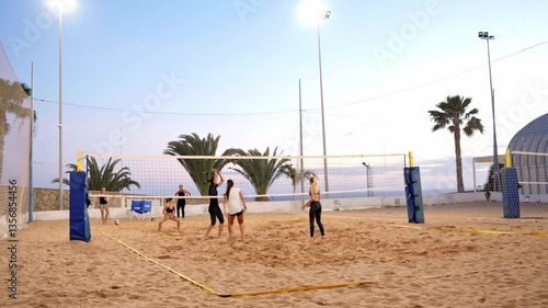 Professional women players scoring a volleyball point